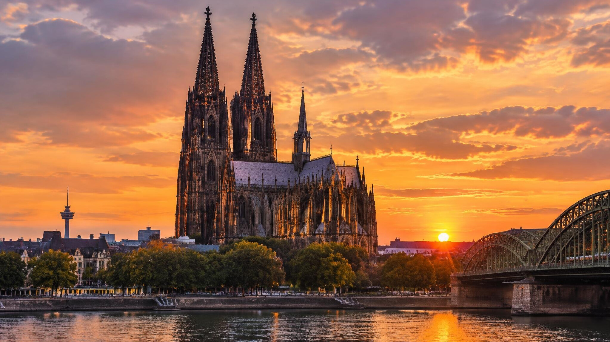 cologne cathedral spires at sunset