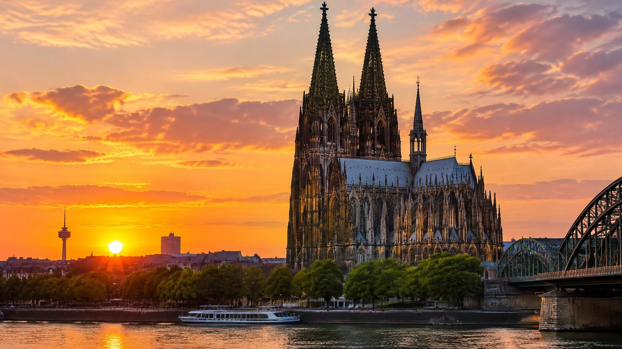 cologne cathedral spires at sunset